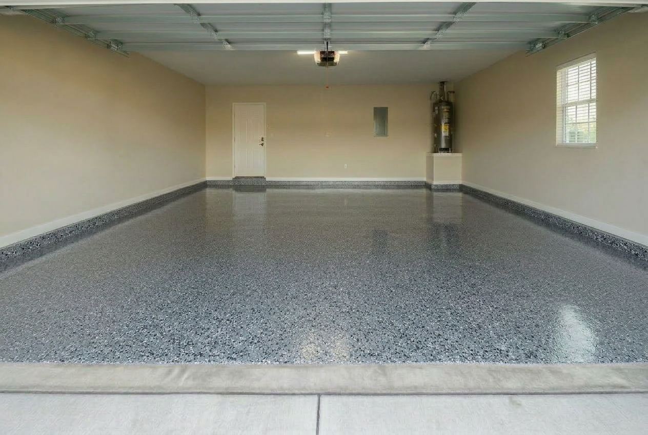 Glossy gray flake epoxy garage floor after ProCoat installation